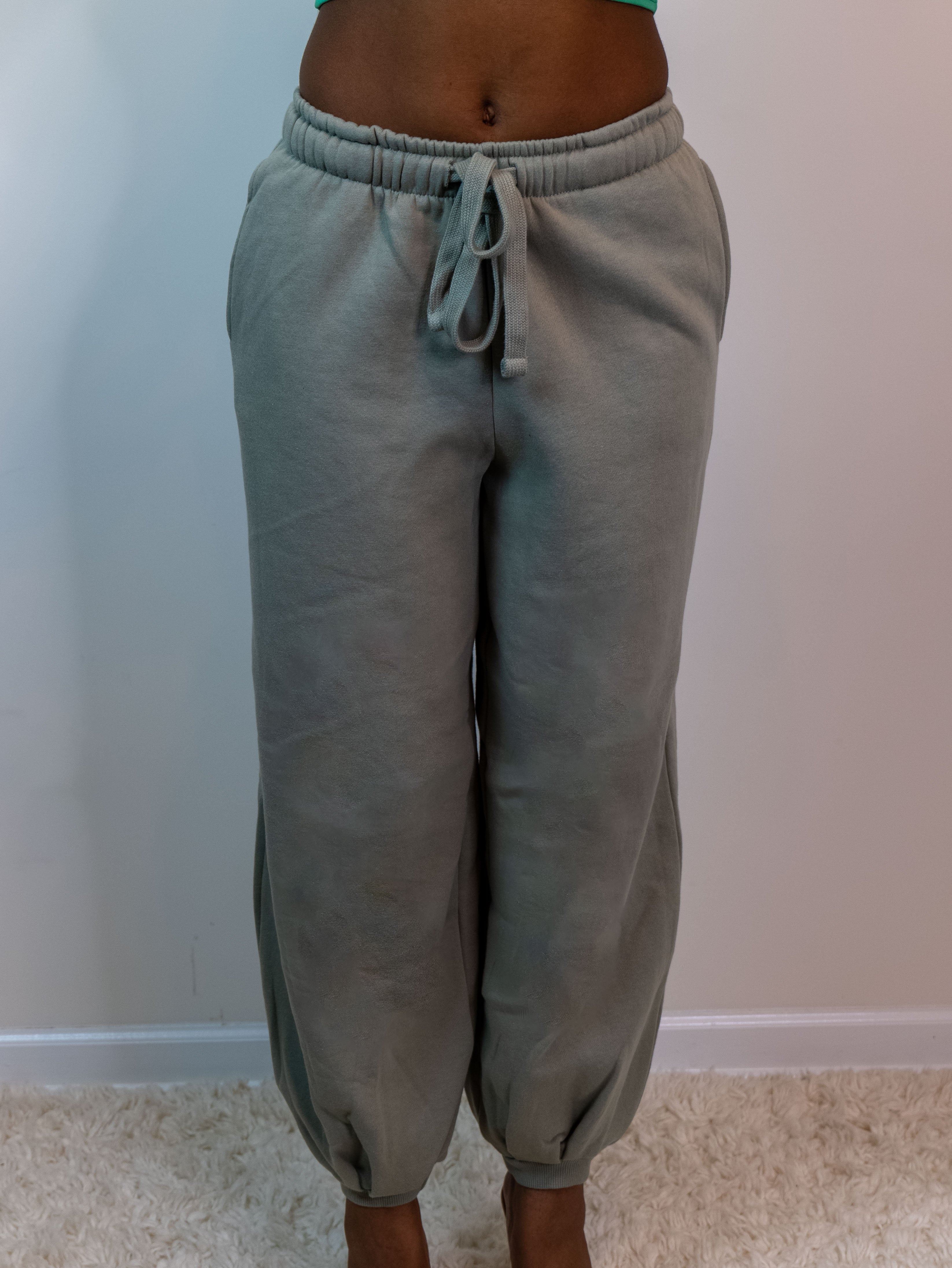 Close up view of the jogger pant, color sage, color may differ due to lighting