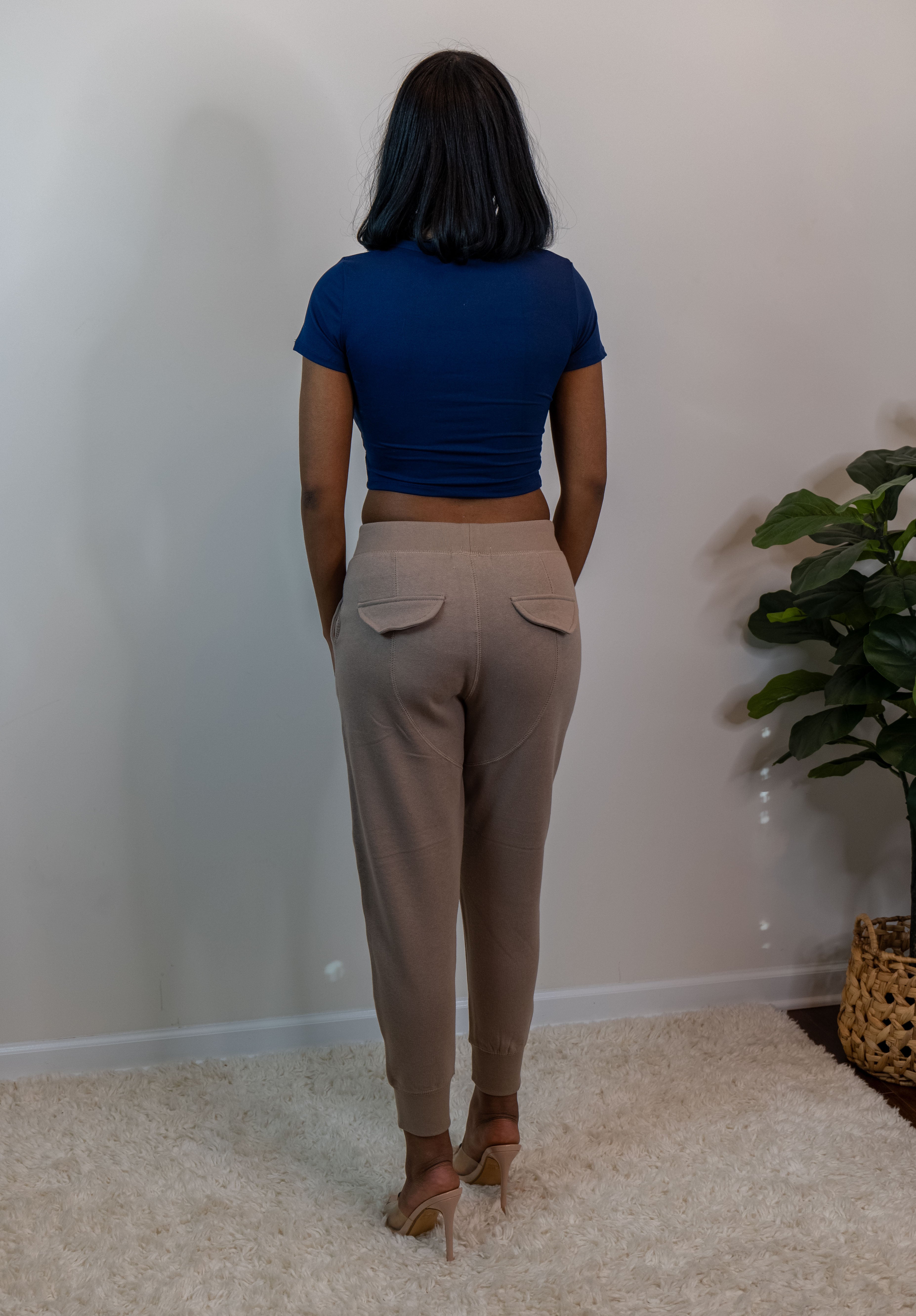 Model showing the back of the sweatpants.