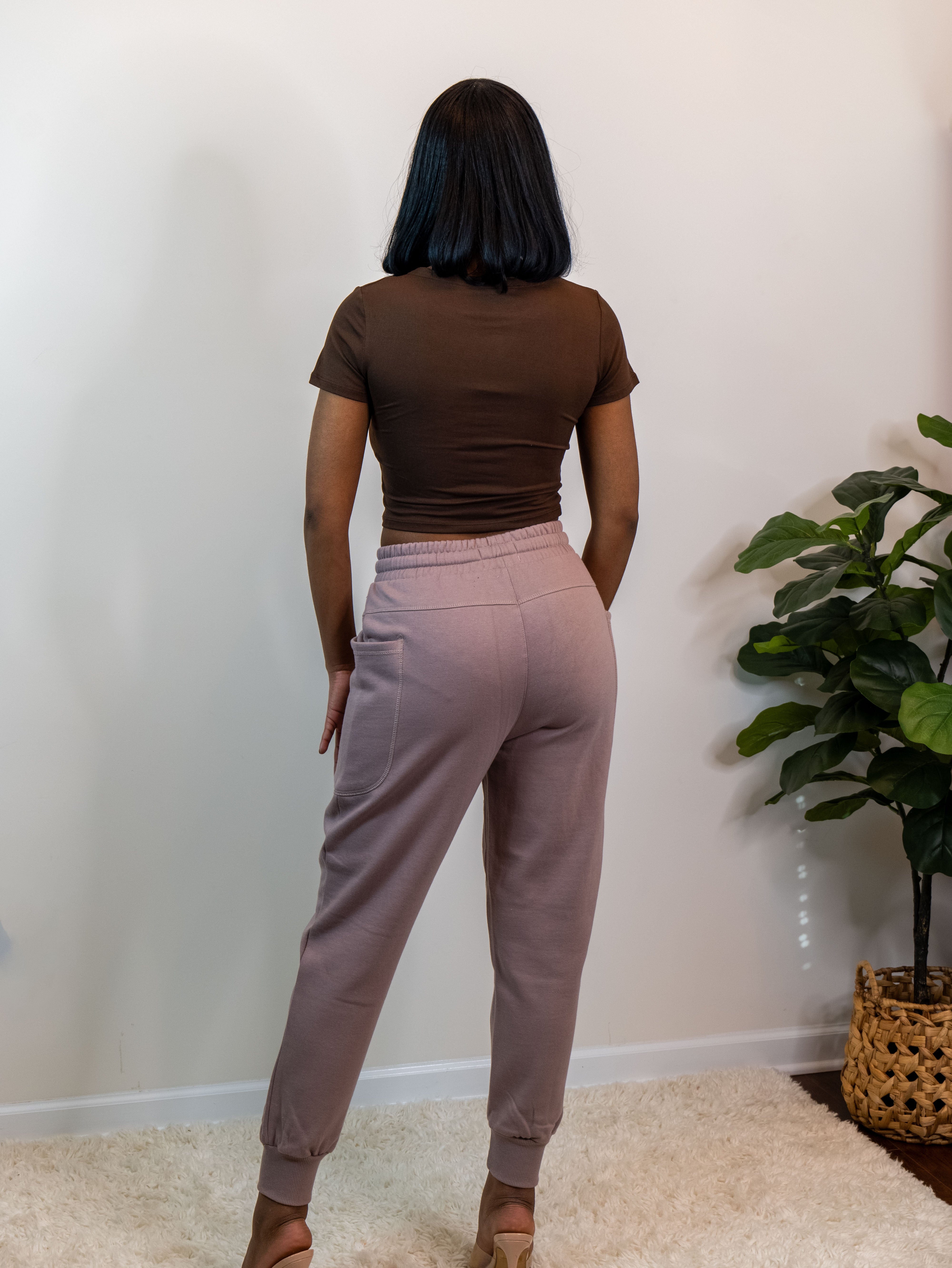 Model showing the back of the sweatpants