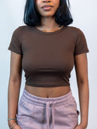 Model showing the upper part of the sweatpants waist band, and the pockets