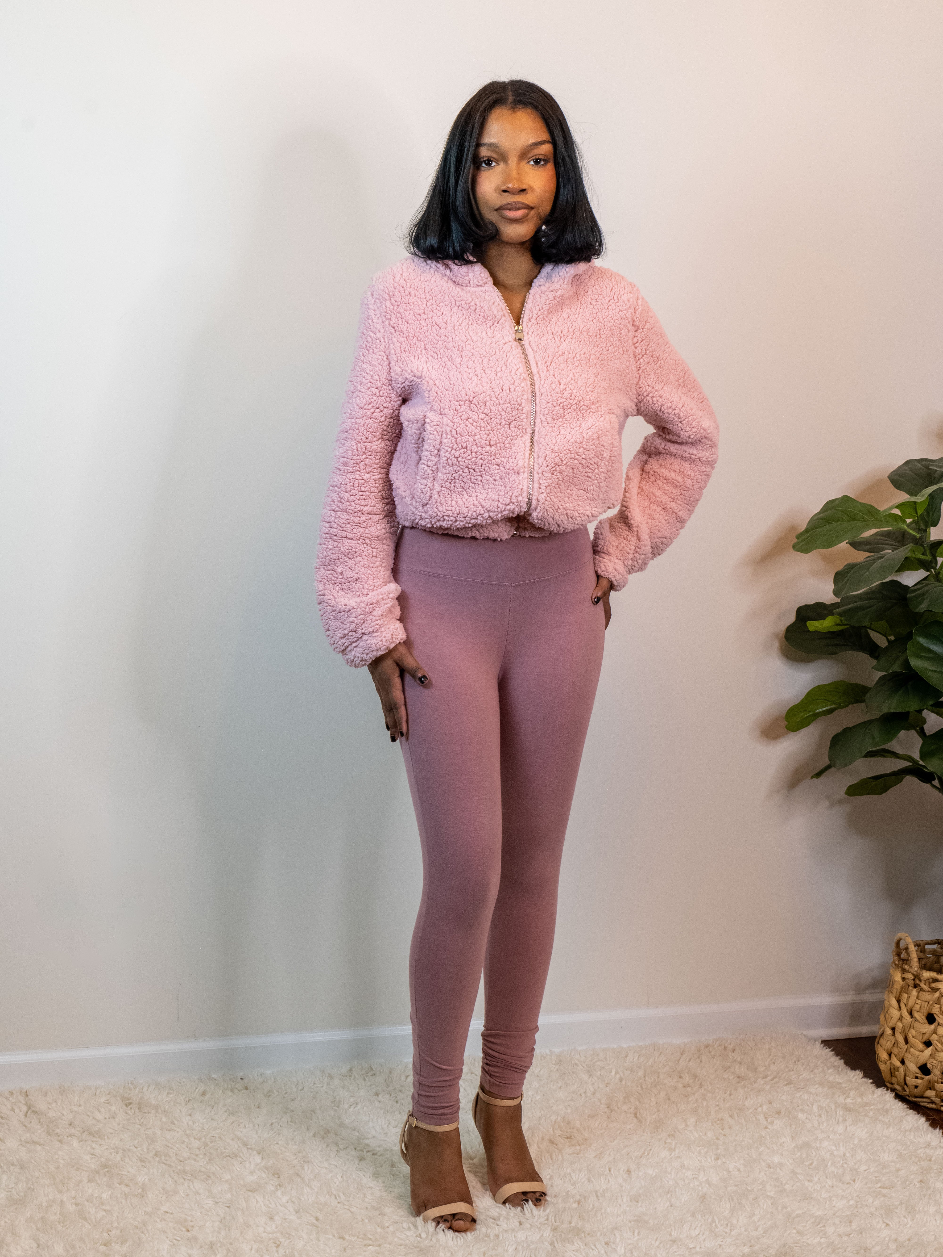 Snug-fitting leggings available in Black, Charcoal, and Dusty Rose, made from 95% cotton and 5% spandex for comfort and stretch. Model is 5'4" wearing a small. Dusty Rose facing front